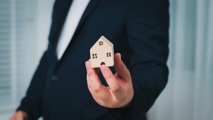 Business growth strategies handing over a model house the real estate sector