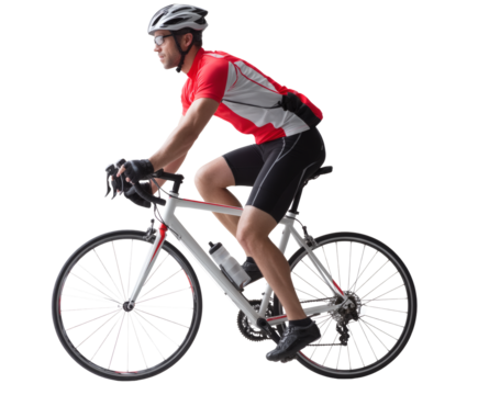 A cyclist in action, pedaling hard on a road bike during an outdoor ride.