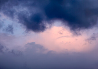 A sunset sky with soft clouds.