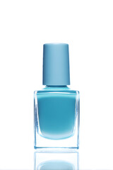 Bottle of Light Blue Nail Polish isolated on white backdrop