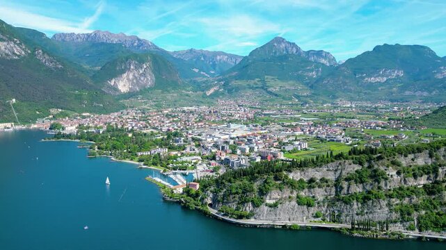 Drone view of northern Lake Garda near Torbole, Linfano. Surrounded by mountains, clear turquoise water, beaches, campings, and Monte Brione&mdash;perfect for nature, sport, and summer vacations