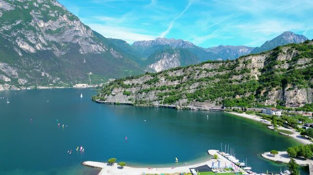 Drone view of northern Lake Garda near Torbole, Linfano. Surrounded by mountains, clear turquoise water, beaches, campings, and Monte Brione&mdash;perfect for nature, sport, and summer vacations