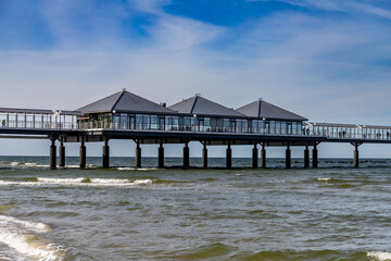Heringsdorf, Mecklenburg-Western Pomerania, Germany - May 29, 2025: Close-Up Of Pier Buildings Over Sea