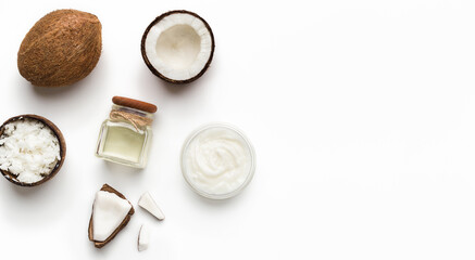 Composition of coconut products on white background top view, copy space