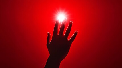 Reaching for the Crimson Dawn - A single hand reaches towards a radiant light, symbolizing hope, faith, aspiration, discovery, and the pursuit of dreams