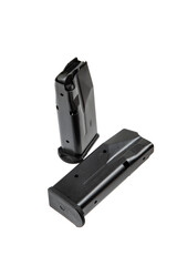 Two black metal pistol magazines for 9mm ammunition, displayed on white back
