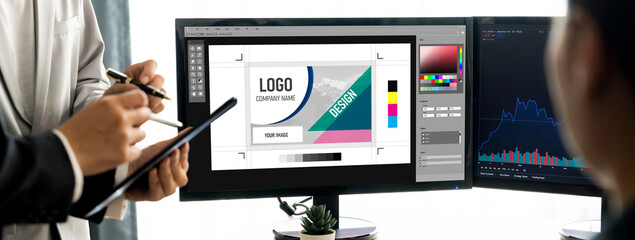 Graphic designer software for modern design of web page and commercial brisk ads showing on the...