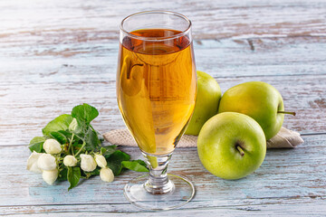 Apple yellow juice in the glass