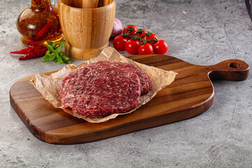 Raw beef burger cutlet for grill