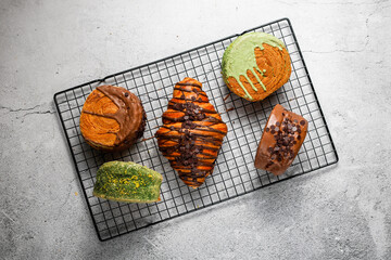 Various new york roll croissants and traditional french croissant with chocolate fillling.