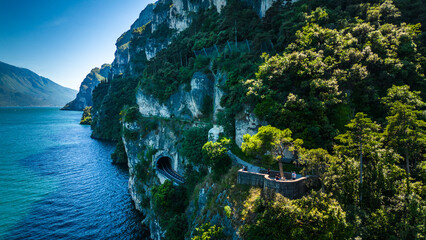 Aerial view of Riva del Garda with Torre Apponale, MAG museum, bike paths, boats and river ferries...