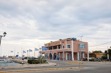 Fair weather enhances the vibrant atmosphere as tourists gather at a friendly waterfront cafe in...