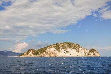 Exploring the pristine shores of Zakynthos reveals breathtaking views of rocky islands and azure waters, perfect for summer adventures and serene relaxation under the sun