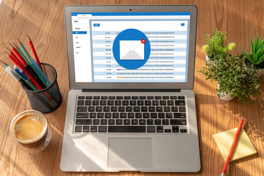 Email notification message showing on computer screen snugly. Digital marketing message information text from business to customer client