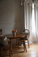 wallpapered playroom with flowers