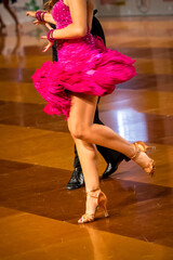 a couple dance a Latin dance. the legs of a dancing couple