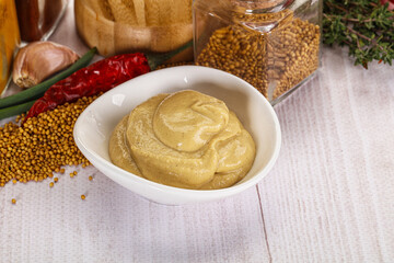 Dijon mustard sauce in the bowl