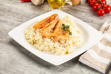 Italian risotto with prawn served thyme