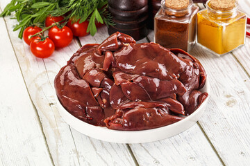 Raw chicken liver uncooked in the bowl