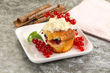 Delicous cupcake with red currant