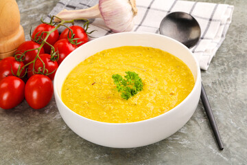 Vegetarian corn cream soup served parsley