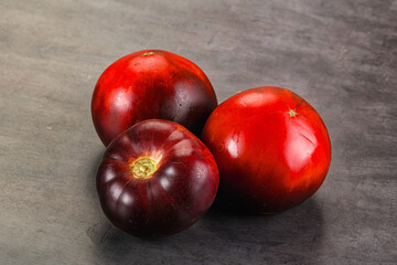Black ripe juicy organic tomato