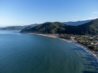 Obraz premium Sunrise in a fishing village on a beautiful beach
