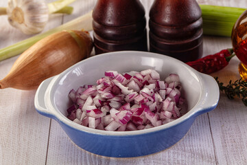 Diced red onion in the bowl