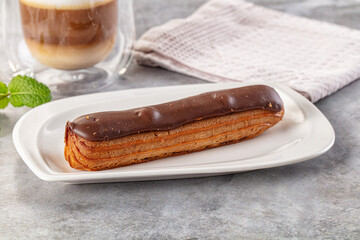 Gourmet chocolate eclair with icing