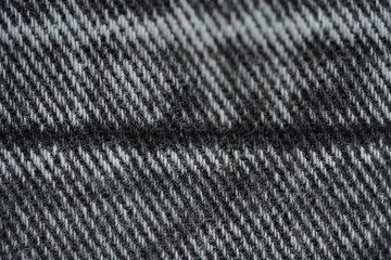 texture of black denim photo from above, seams on denim denim fabric macro