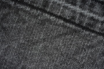 texture of black denim photo from above, seams on denim denim fabric macro