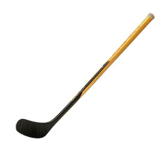 Wooden hurling stick resting on ground in a grassy field during daylight hours