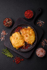 Steak, a pork or chicken chop covered with melted cheese. Grilled meat