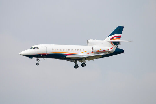 Executive Business Jet Falcon 2000 Approaching, Clear Blue Sky