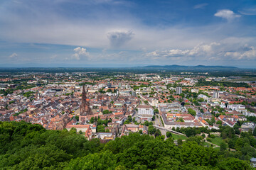 Naklejka premium Panoramic Cityscape View with Historic Cathedral and Urban Surroundings