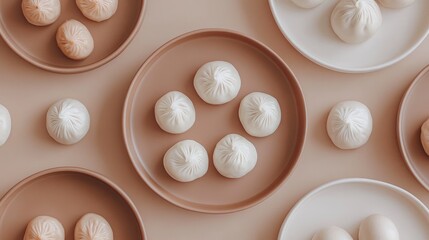 Minimalist modern presentation of dim sum on matte ceramic plates with clean background