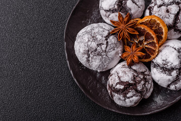 Chocolate crinkle cookies sprinkled with powdered sugar, homemade baking