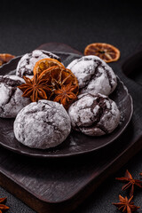 Chocolate crinkle cookies sprinkled with powdered sugar, homemade baking