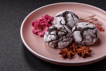 Chocolate crinkle cookies sprinkled with powdered sugar, homemade baking