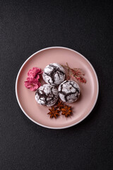 Chocolate crinkle cookies sprinkled with powdered sugar, homemade baking