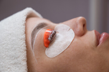 The process of professional lamination and dyeing of eyelashes and eyebrows in the salon. 