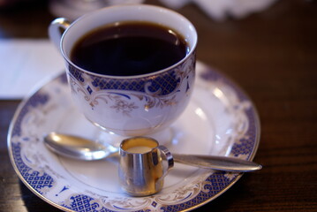 和柄カップのブラックコーヒー
