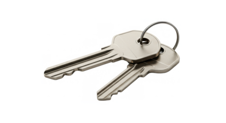 Keys on a ring resting on a flat surface with a neutral background  