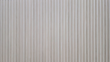 Coffee shop counter surface made of cream laminate wood. Cream colored wood texture. Corrugated...