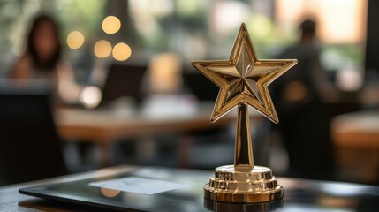 Gold star award on table in blurry cafe background.