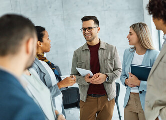 Group of young business people having a meeting or presentation and seminar in the office