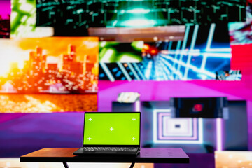Empty scene with a pc showcasing copy space display next to artistic lights, creating a soundscape for nightlife ambiance and music culture. Spreading the visual art vibes and creativity.