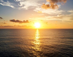 Fototapeta premium Sunset over a calm ocean