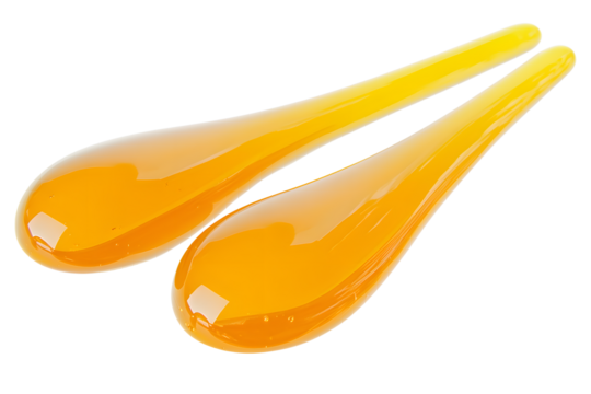 High-resolution image of golden yellow oil droplets merging and separating, Isolated on white background