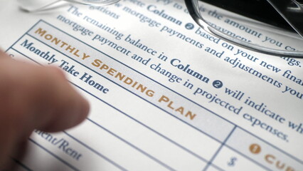Finger tapping on monthly spending plan